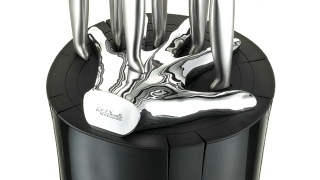 Illustration for article titled Stylish Knife Block Lets You Safely Play Five Finger Fillet
